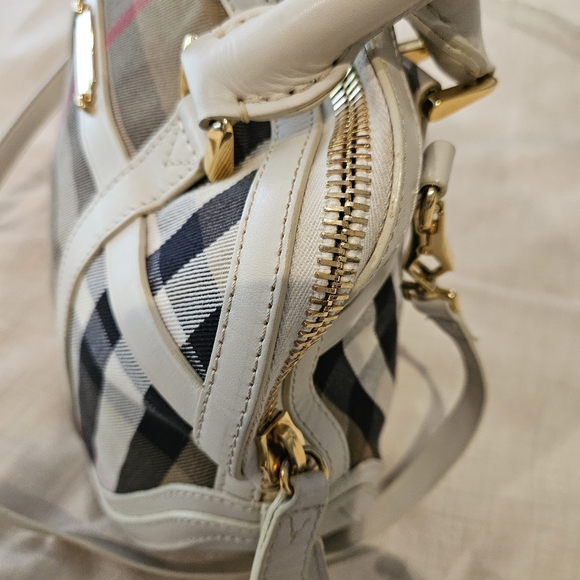 Burberry is a little over-sized crossbody with a top handle bag. Rarely used. - Picture 3 of 7